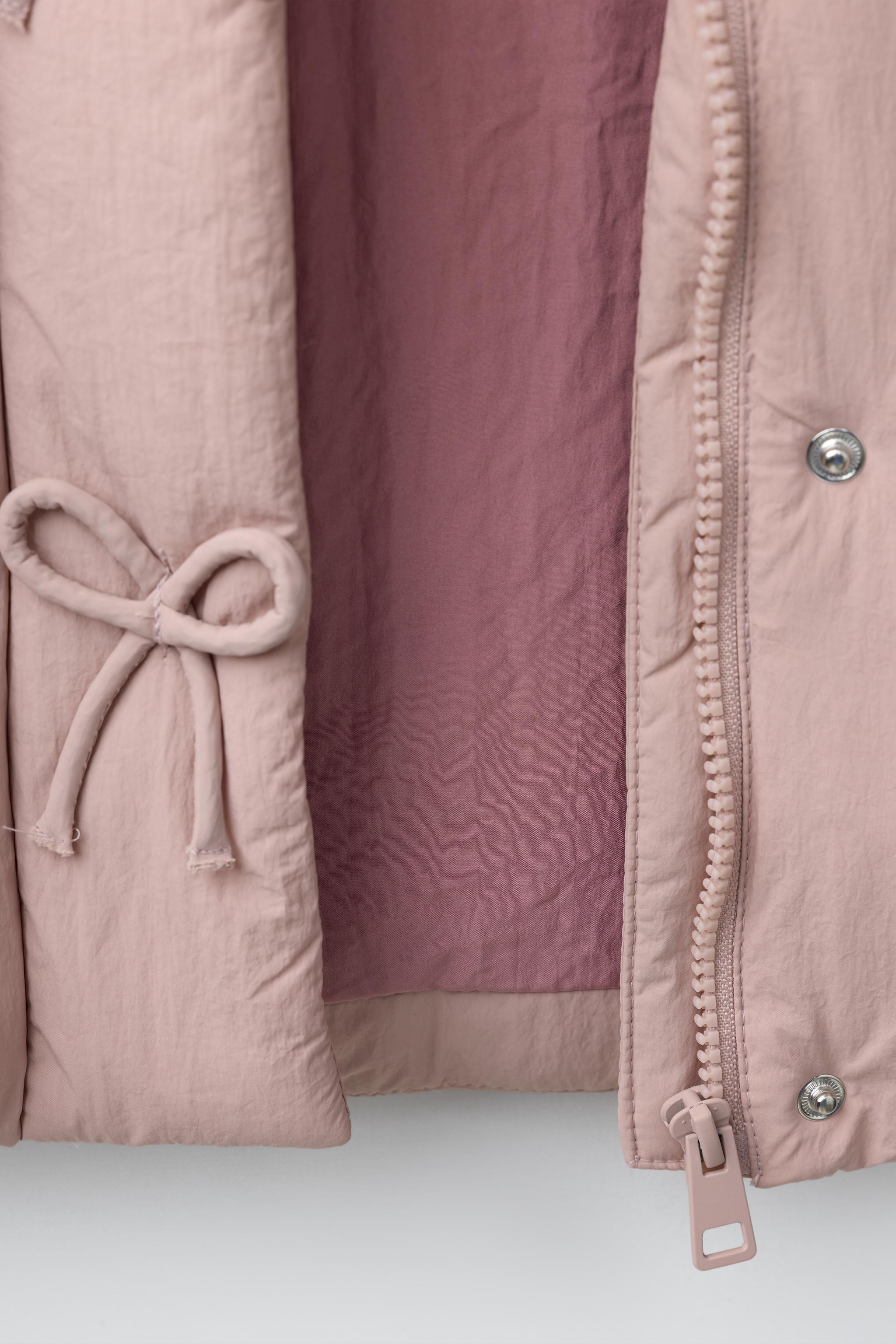 MANTEAU MATELASSÉ DÉPERLANT À NŒUDS